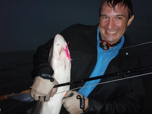 Jimmy embracing a shark Jimmy embracing a shark