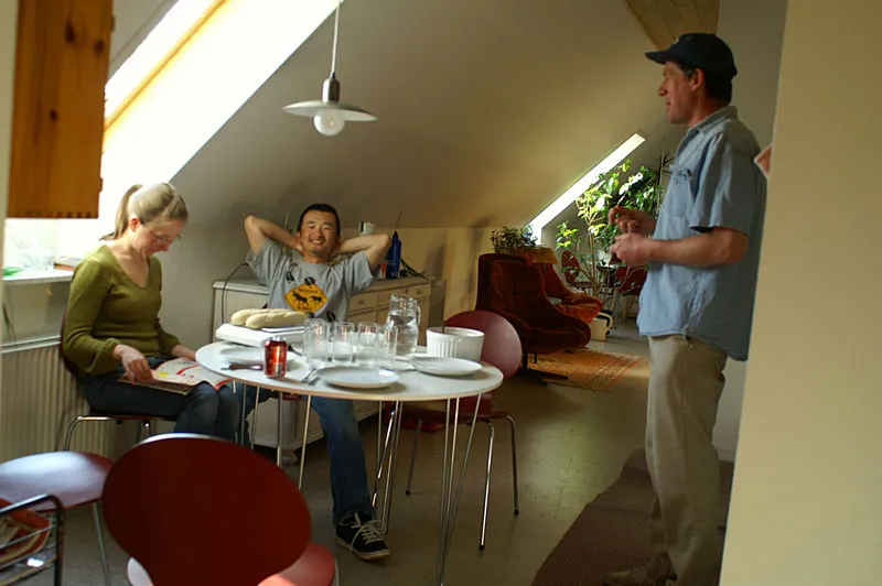 Preparing dinner - Rod and Nina by the table and Bill standing